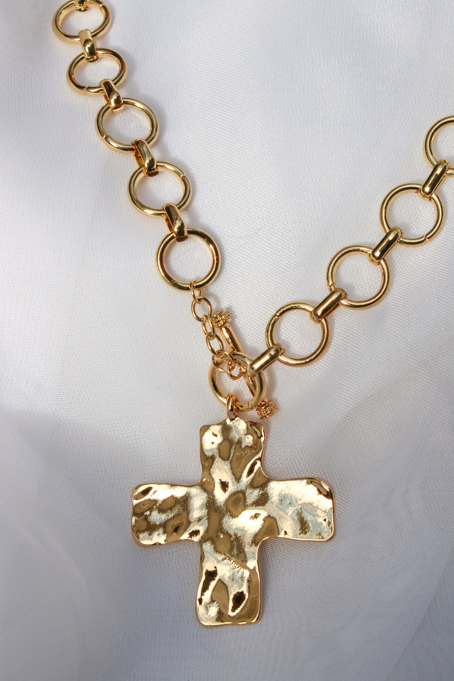 HAMMERED CROSS NECKLACE