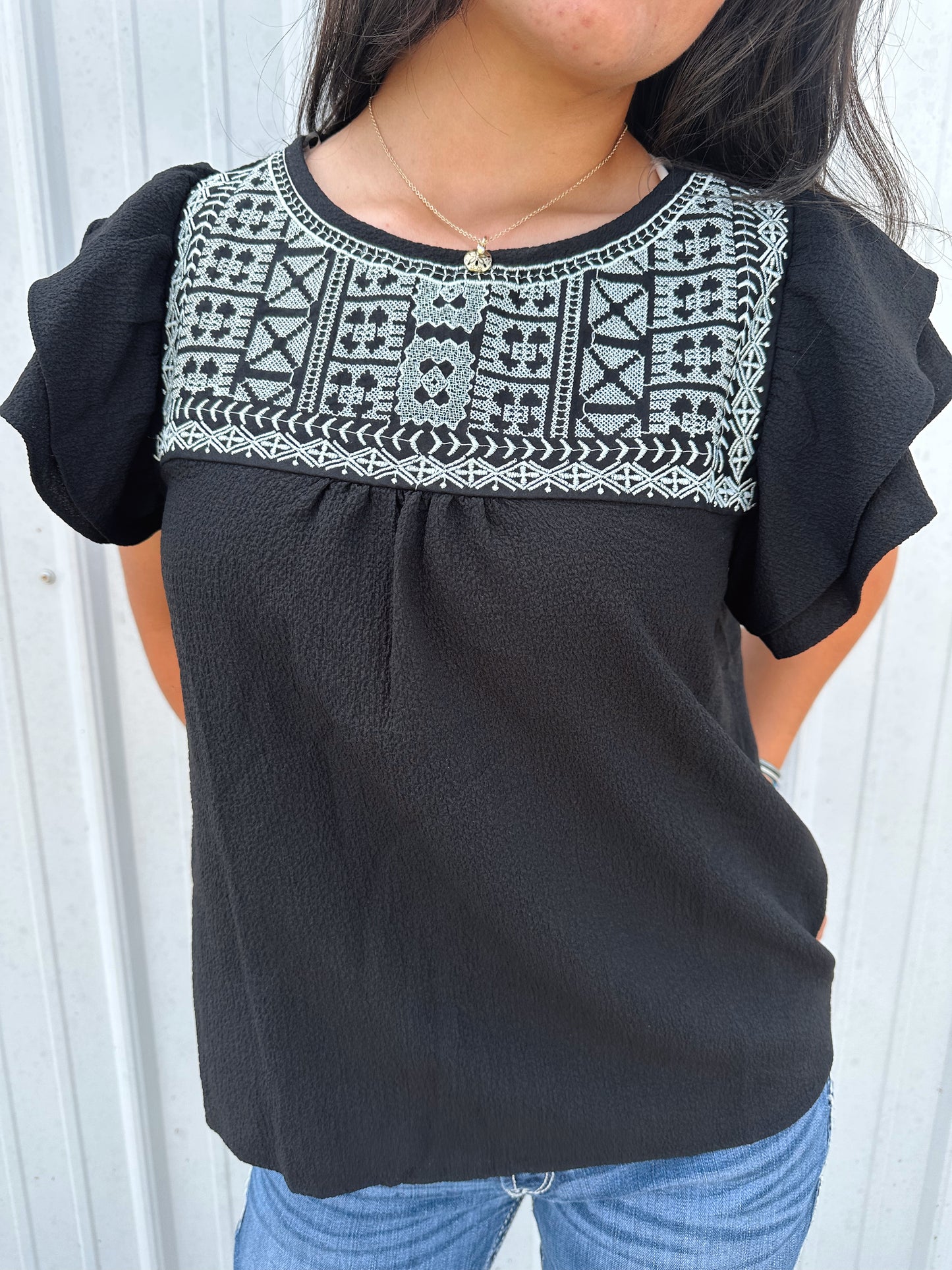 EMBROIDERED RUFFLE TOP