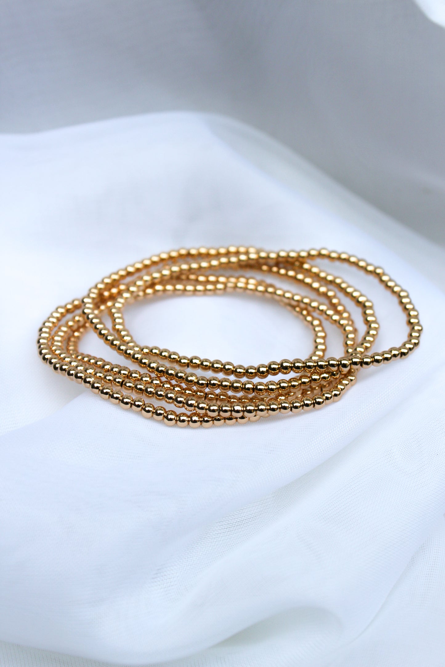GOLD BEADED BRACELET STACK